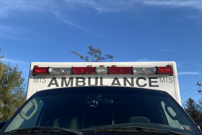 lady riding in ambulance